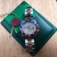 นาฬิกา Rolex รุ่น GMT Master II สีเงิน กรอบเซรามิค น้ำเงิน-แดง สายเลสสีเงิน หน้าปัดสีขาว งาน Mirror Swiss