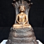 หลวงพ่อเจ็ดกษัตริย์ พระพุทธสิริสัตตราช ( พระบูชา ปางพระนาคปรก ขนาดหน้าตัก 4นิ้ว เนื้อโลหะชนวน รมดำ )